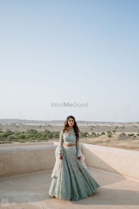 Bride wearing a powder blue lehenga on her Sangeet.