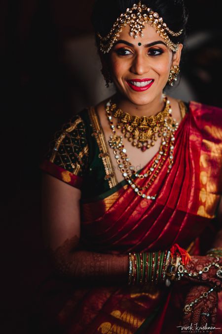Photo of South indian bridal look with temple jewellery necklace