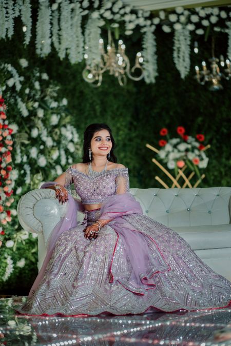 Photo of lavender lehenga for engagement or sangeet with boat neck blouse