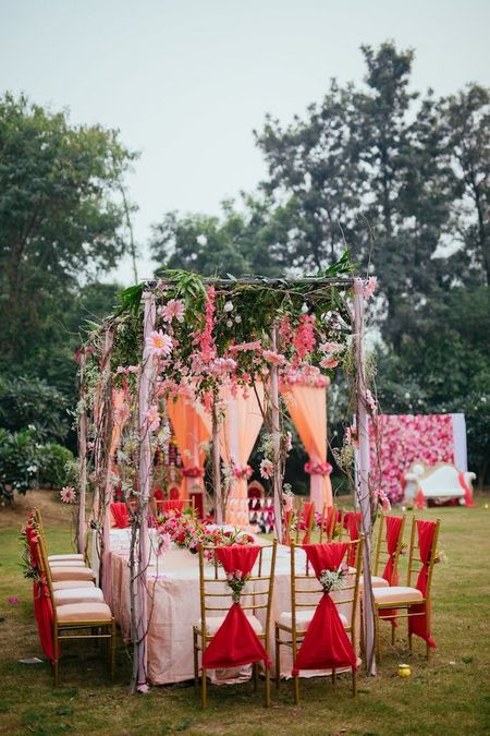 Long table setting with canopy overhead 