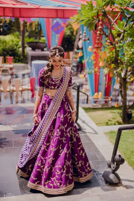 A bride in purple lehenga