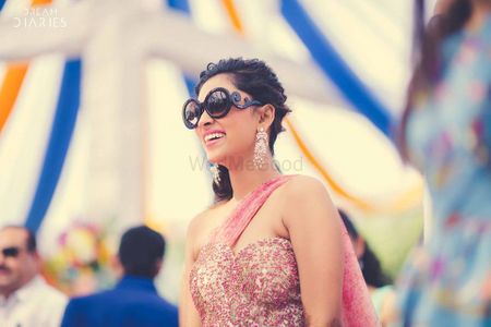 Photo of Bride with sunglasses