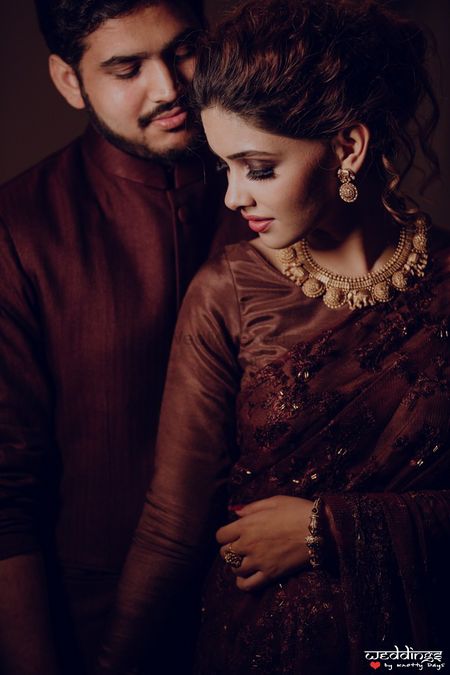 Photo of Engagement or sangeet couple portrait in brown