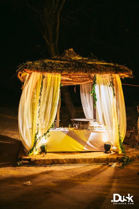 Photo of rustic south indian mandap with white drapes