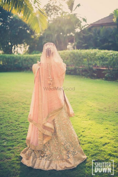 peach and pista green bridal lehenga