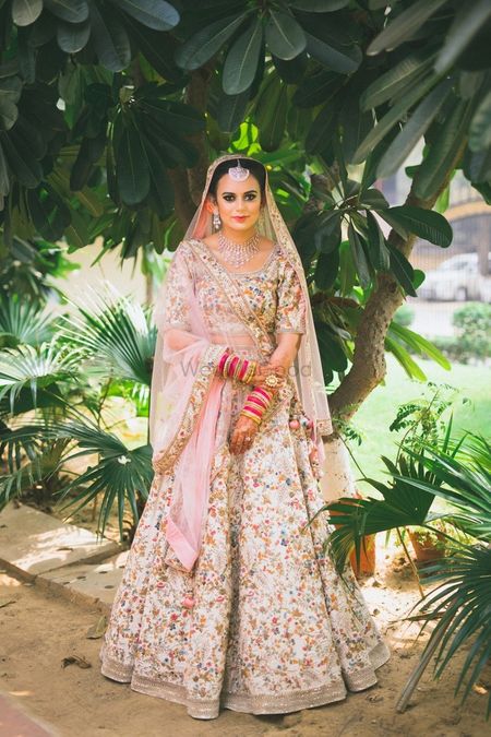 Floral embroidery cream and pink lehenga