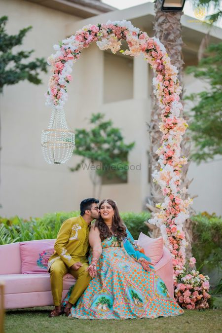 Summer mehendi outfit ideas for bride & groom