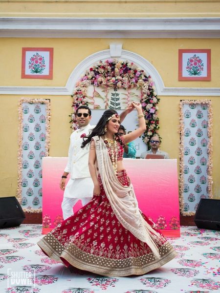 Photo of Bride and groom dancing on printed dance floor