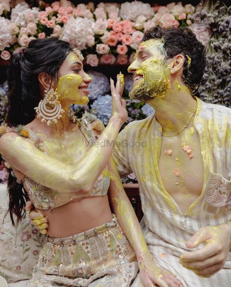 Alanna & Ivor in pastel outfits on their haldi ceremony 