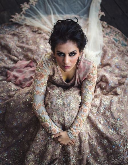 Sabyasachi bride with lehenga all flared out 