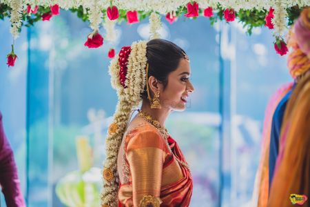 South indian bridal hairstyle with floral jada 