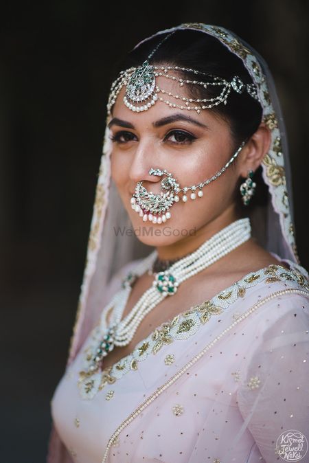 Unique bridal jewellery with vintage Nath and mathapatti