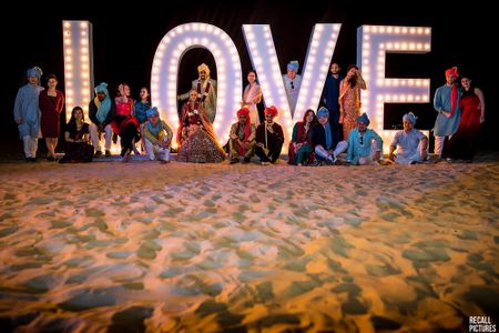 Photo of Giant love prop for beach wedding