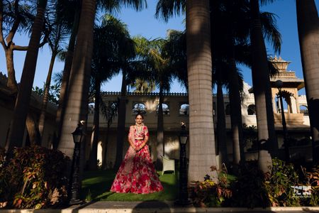 Photo of Beautiful bridal portrait of a bride in a red lehenga