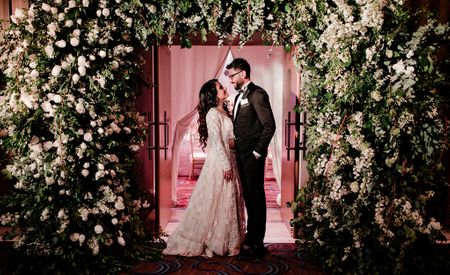 Engagement couple portrait with grand entrance decor