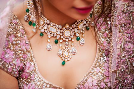 A gorgeous wedding day statement necklace worn by the bride