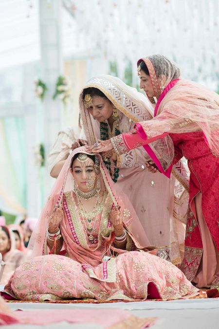 Sikh bride in pastel pink with vintage jewellery