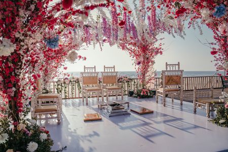 Photo of Floral mandap by the beach.