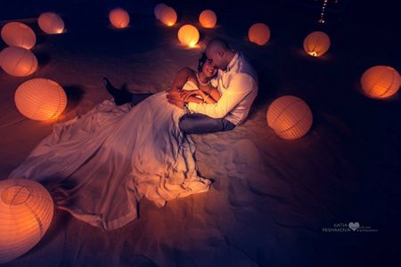 Photo of bride and groom couple portrait in the sand