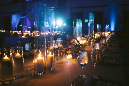 Photo of glass vases with candles