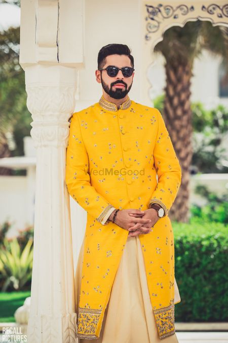 Photo of Offbeat mehendi groomwear in yellow colour