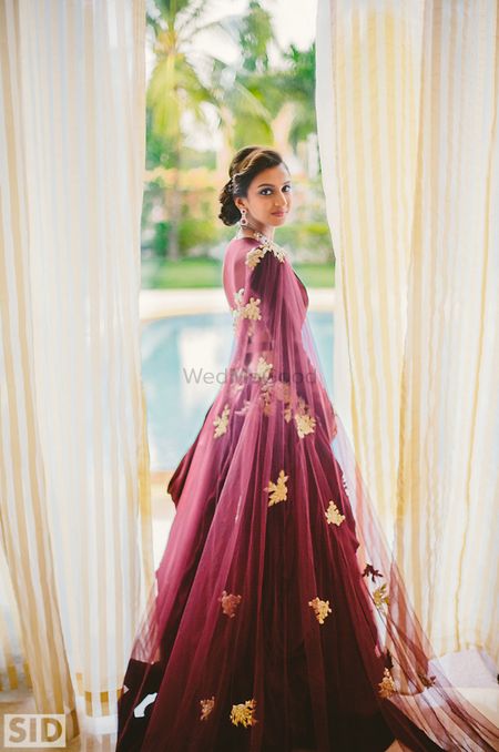 Photo of Wine colored gown by Jay Makhija