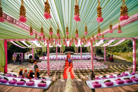 Photo of Pink and green anand Karaj decor with hanging gota strings