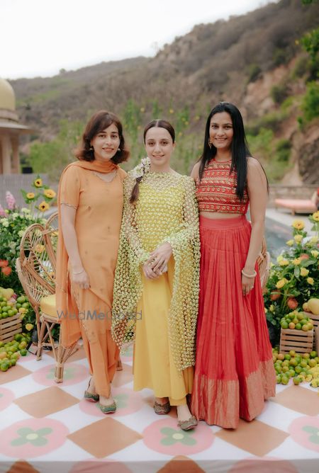 Photo of Bride wearing a simple mogra bud dupatta with a yellow outfit