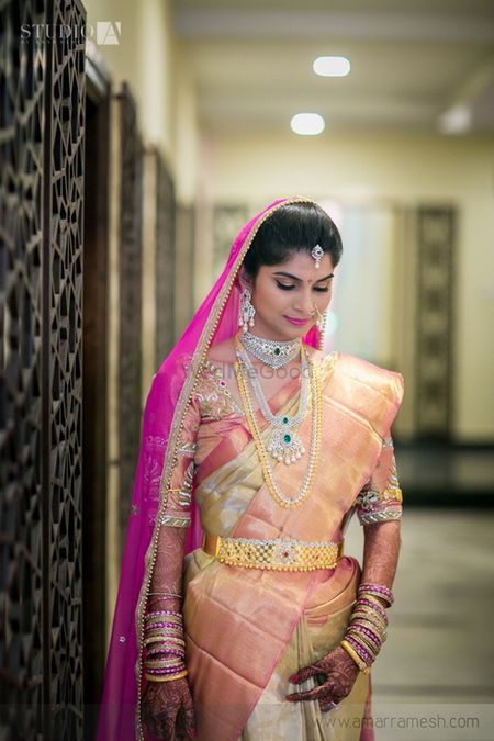 wedding kanjivaram bridal saree in soft blush pink and gold