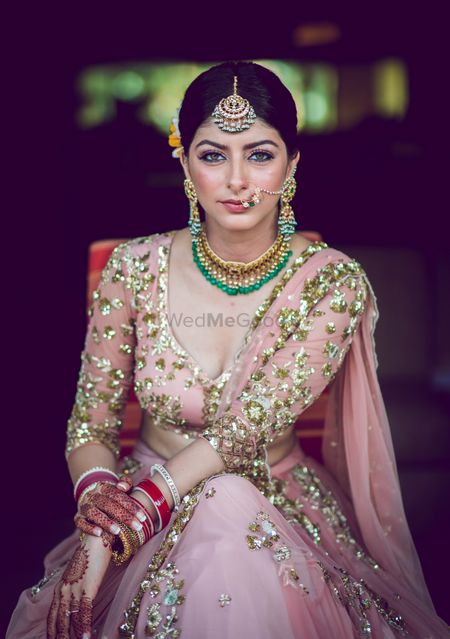 A bride poses for a perfect click before she ties the knot. 