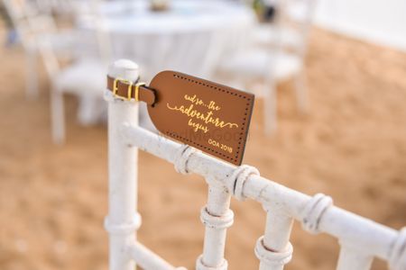 Photo of Luggage tags as favours on chairs