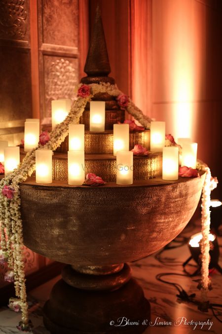 Photo of Bronze copper pot with candles