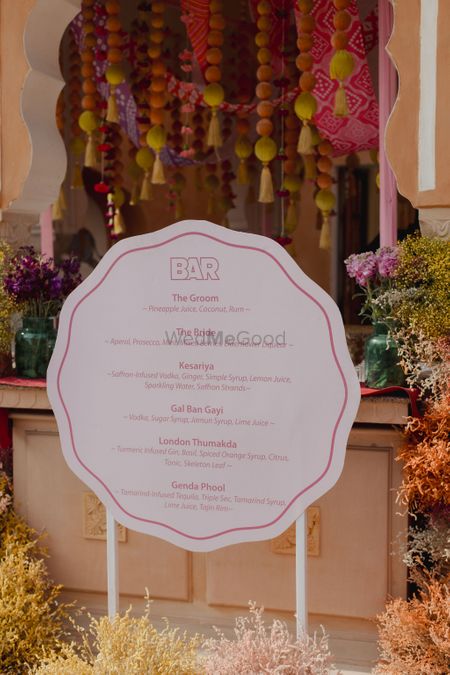 Personalised cocktail bar menu with groom and bride personalised drinks