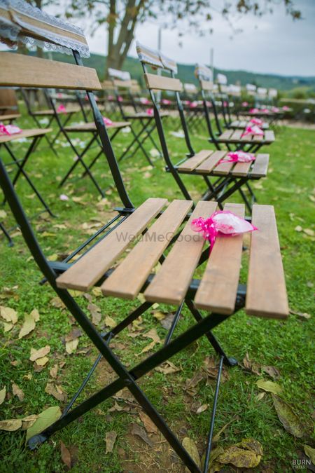 Chairs with petals for guests to throw
