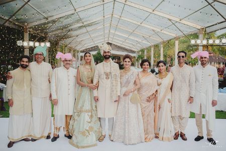 Coordinated family in pastel wedding photo