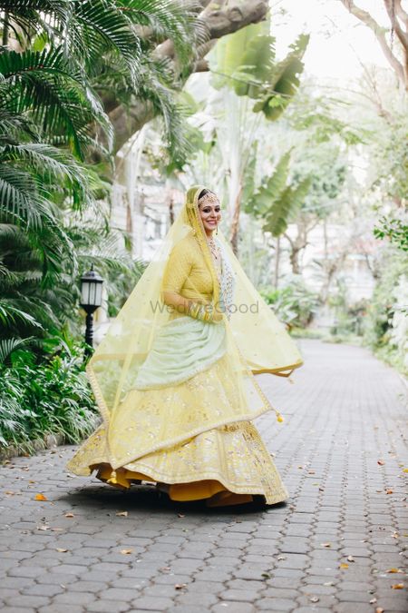 Unique bridal lehenga in yellow and mint