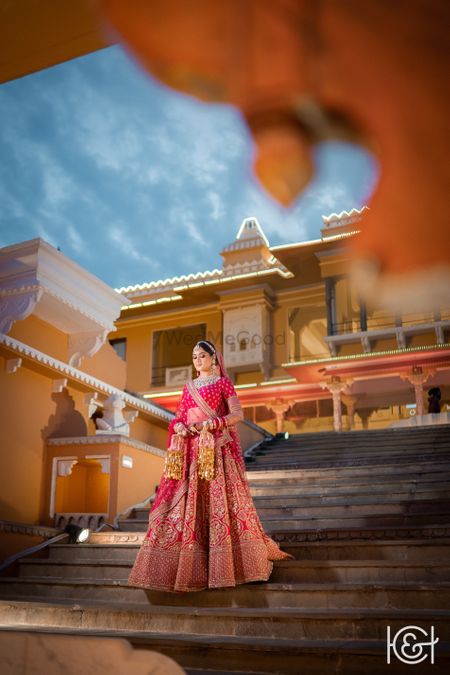 bride in gorgeous pink lehenga for wedding day