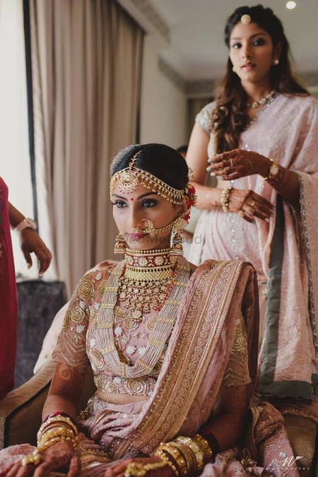 A bride getting ready in stunning jewellery