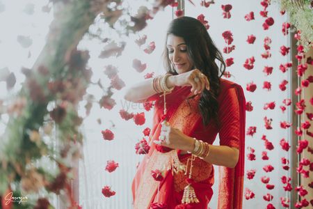 Bride in a red wedding saree for her intimate wedding 