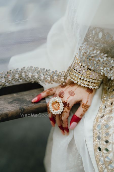 Statement cocktail ring with pearls and stacked kundan bangles