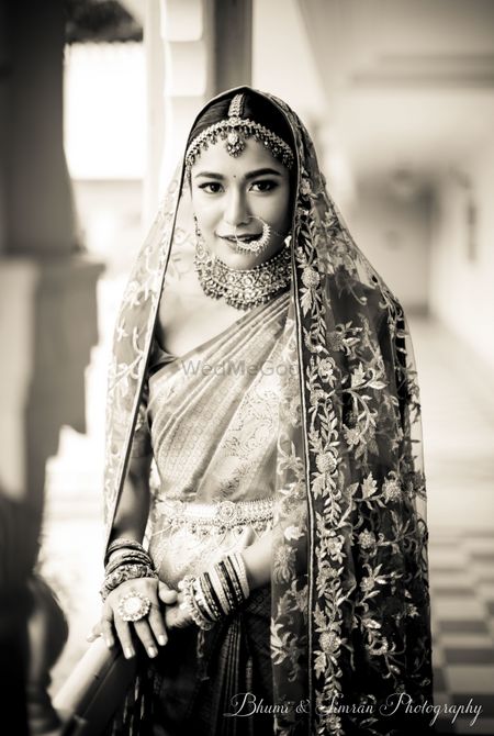 Bride with saree and dupatta on wedding day black and white photo