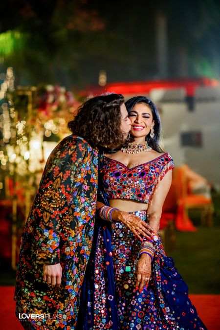 twinning bride and groom in mirror work outfits for sangeet