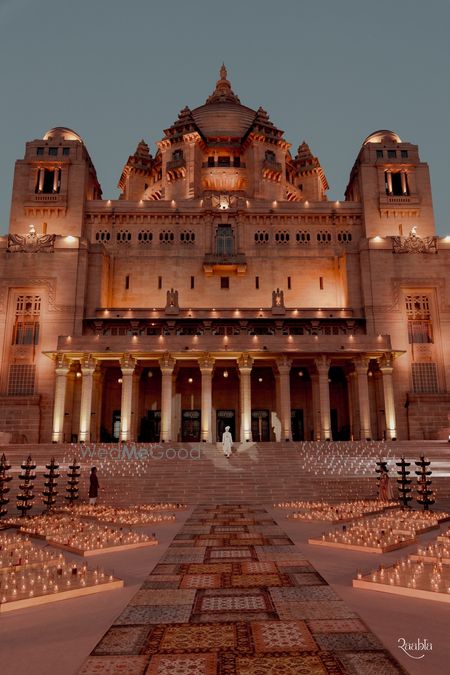 Photo of Stunning shot of the palace for the wedding venue filled with lights