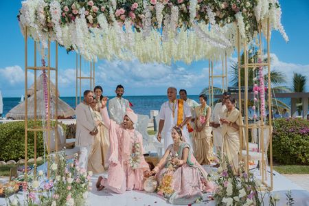 Photo of floral mandap idea for beachside wedding