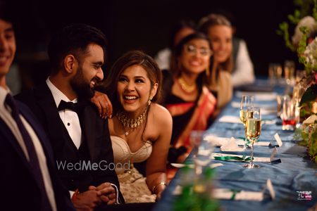 Photo of cute couple candid shot during reception