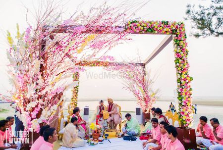 Floral mandap decor idea for beach wedding