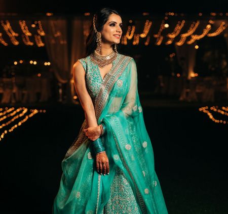 Bride in a gorgeous blue lehenga for sangeet 