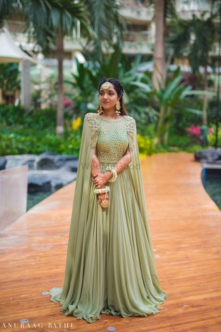 Cape lehenga for engagement in sage green