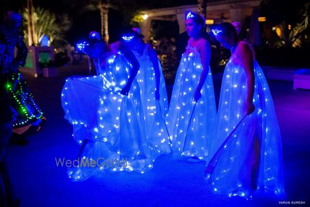 Photo of bride and groom entry ideas with fairies and twinkling