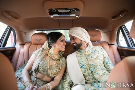 Photo of Bright and happy couple shot in car